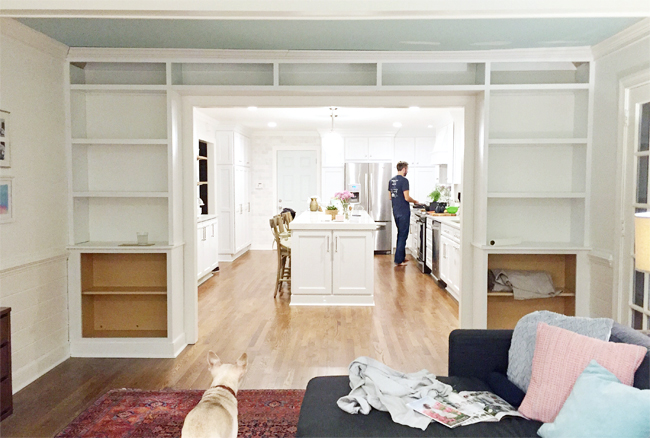 DIY bookshelves mid construction with face pieces on unfinished edges