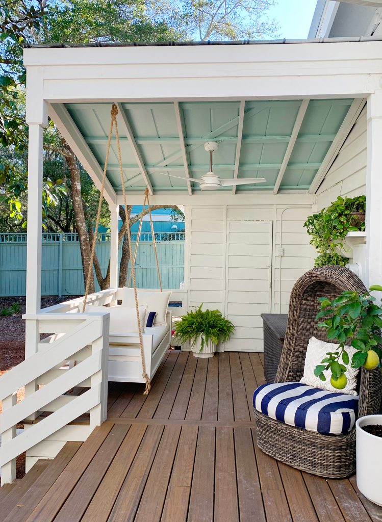 Finished White Hanging Daybed Under Covered Front Porch